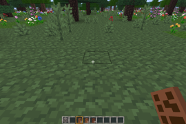 Holding a milk chocolate bar